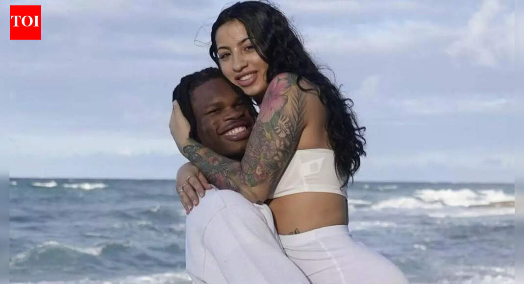 Travis Hunter’s wife Leanna turns heads in chic white bikini selfie during family birthday celebration