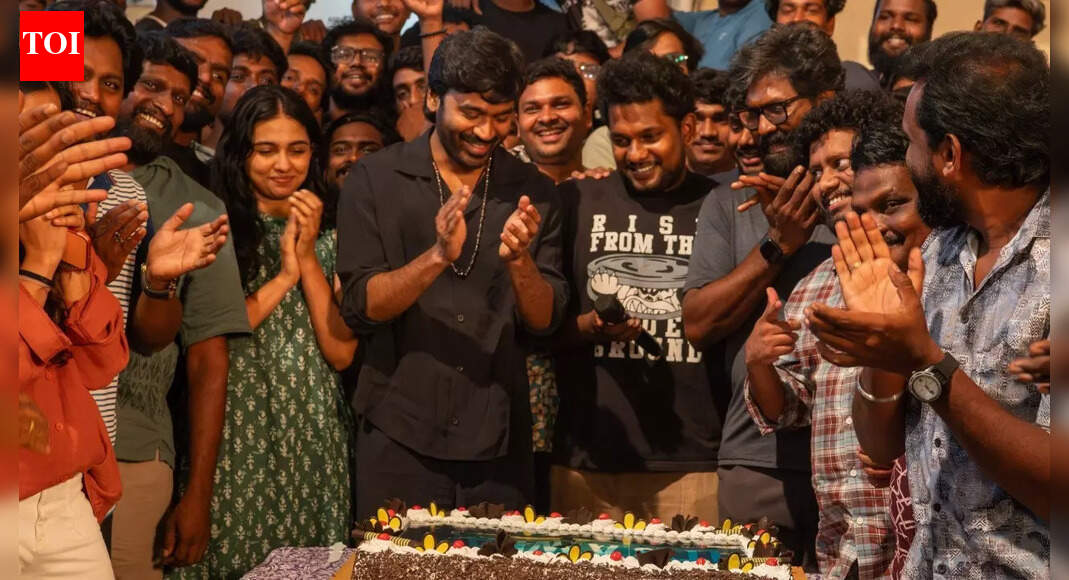 'D54': Dhanush wraps up Vignesh Raja's directorial with a cake cutting; Mamitha Baiju steals the spotlight
