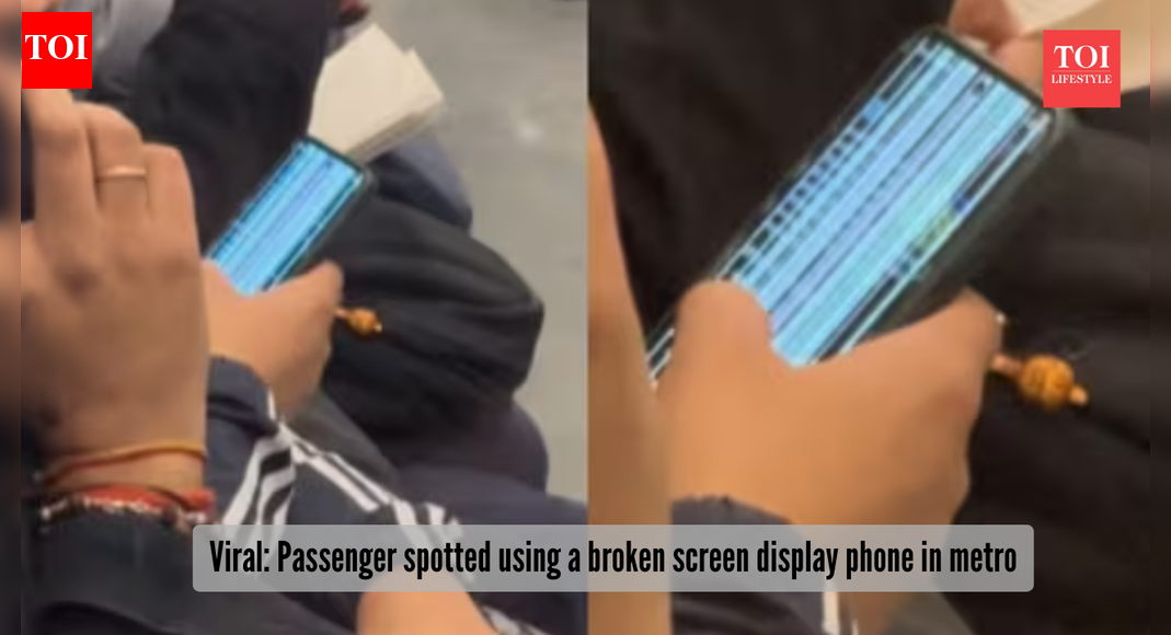 Not careless, just priorities: Viral video shows a metro passenger using broken phone; social media erupts with empathy