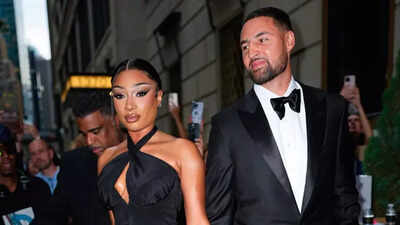 Megan Thee Stallion and Klay Thompson tease a holiday moment on a boat with their dog