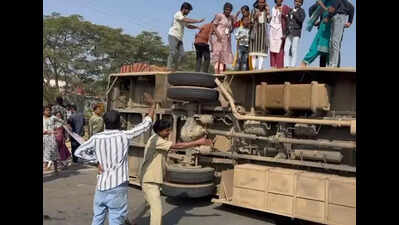 Lucky escape for 60 students as bus hits median & flips on Hyd-B’luru highway
