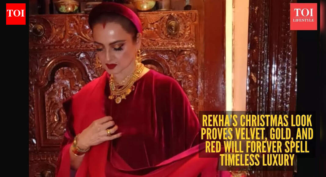 Rekha does Christmas the only way she knows - draped in luxe velvet tunic and red saree