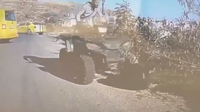 Video: Israeli settler drives ATV into Palestinian kneeling for prayer; IDF confiscates weapon