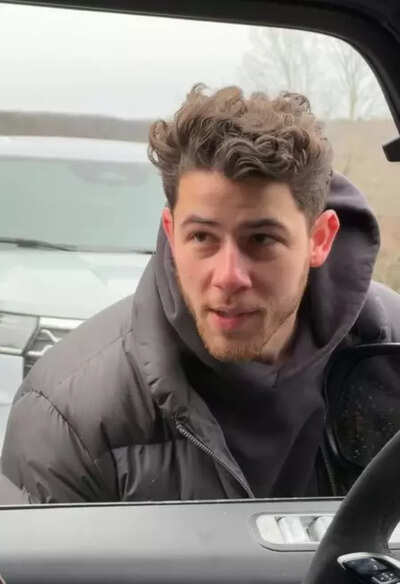 Nick Jonas throws a snowball at Joe to announce his new single releasing on New Year’s Day