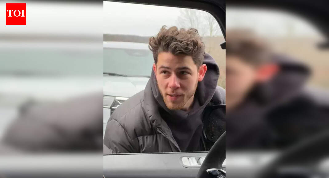 Nick Jonas throws a snowball at Joe to announce his new single releasing on New Year’s Day