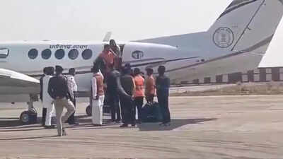 ‘Wastage of public money’: Congress targets video of Bageshwar Dham head on govt plane, cop touching feet; BJP hits back