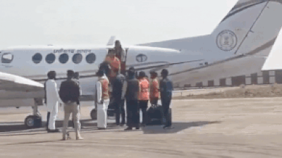 ‘Wastage of public money’: Congress targets video of Bageshwar Dham head on govt plane, cop touching feet; BJP hits back