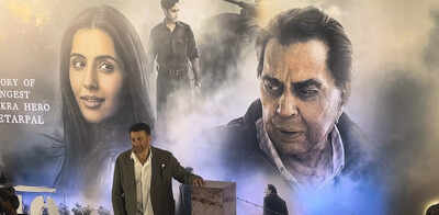 'Ikkis' screening: Sunny Deol stands beside his father Dharmendra's photo at the event in Mumbai