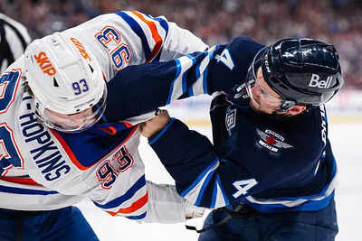 Ryan Nugent-Hopkins and Neal Pionk drop gloves in spirited Edmonton Oilers and Winnipeg Jets game