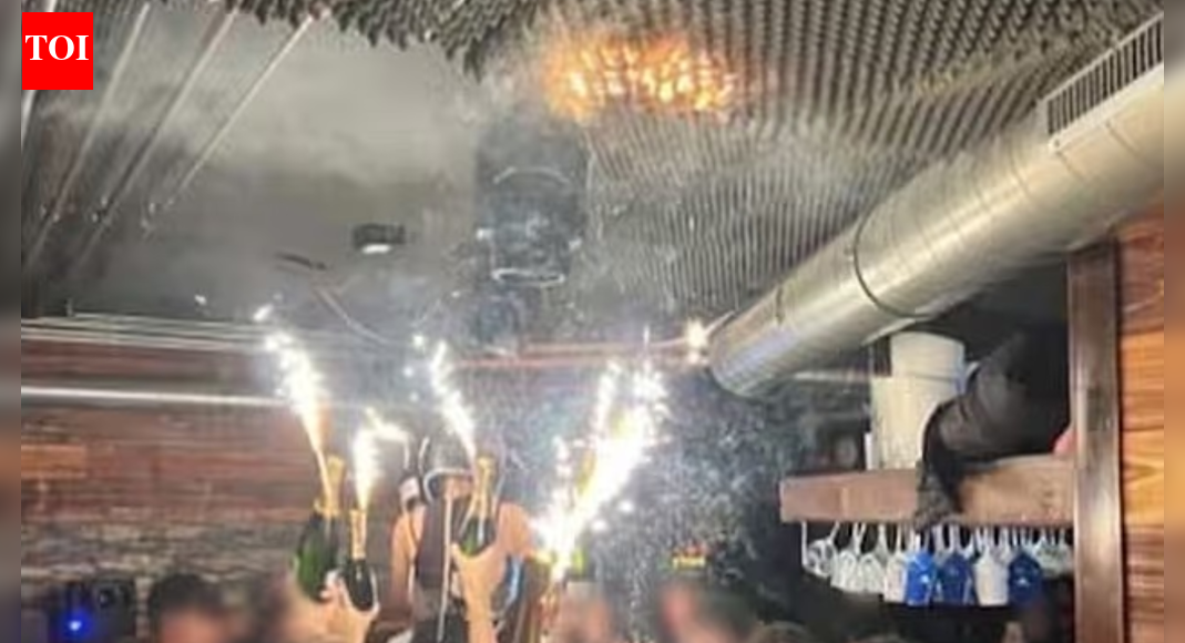 Sparklers & champagne: New photos show moment blaze erupted in Swiss bar