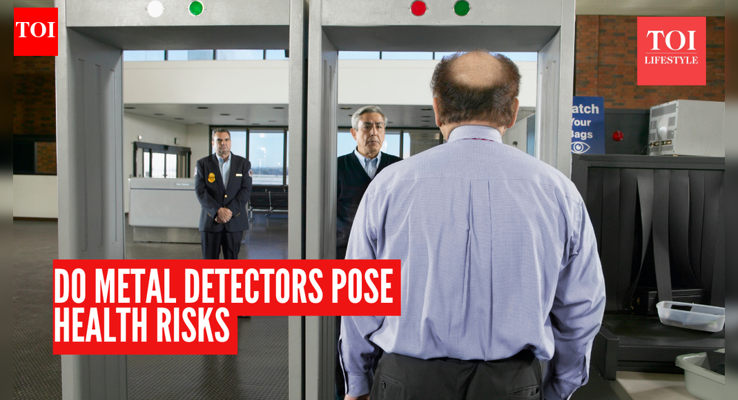 Are there any health risks of walking through metal detectors?