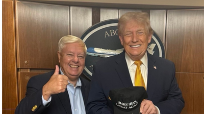 Trump signs 'Make Iran Great Again' hat for Republican senator who hopes 2026 will be the year that...