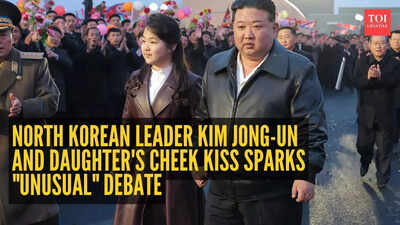 North Korean leader Kim Jong-un and daughter's cheek kiss sparks "unusual" debate - What's really going on?