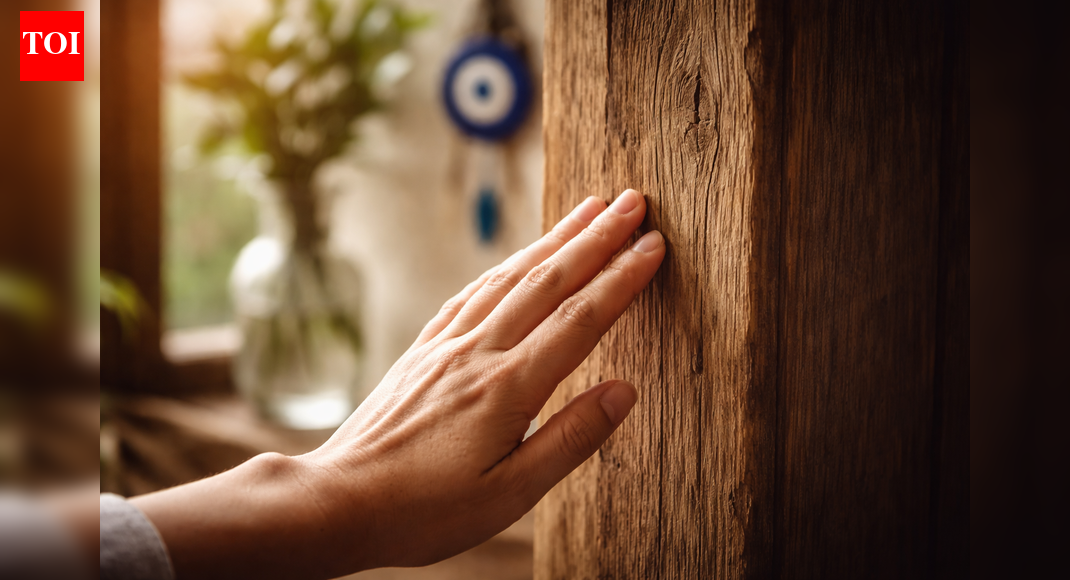 Why do we say 'touch wood'? How does wood keep a person safe from evil eye