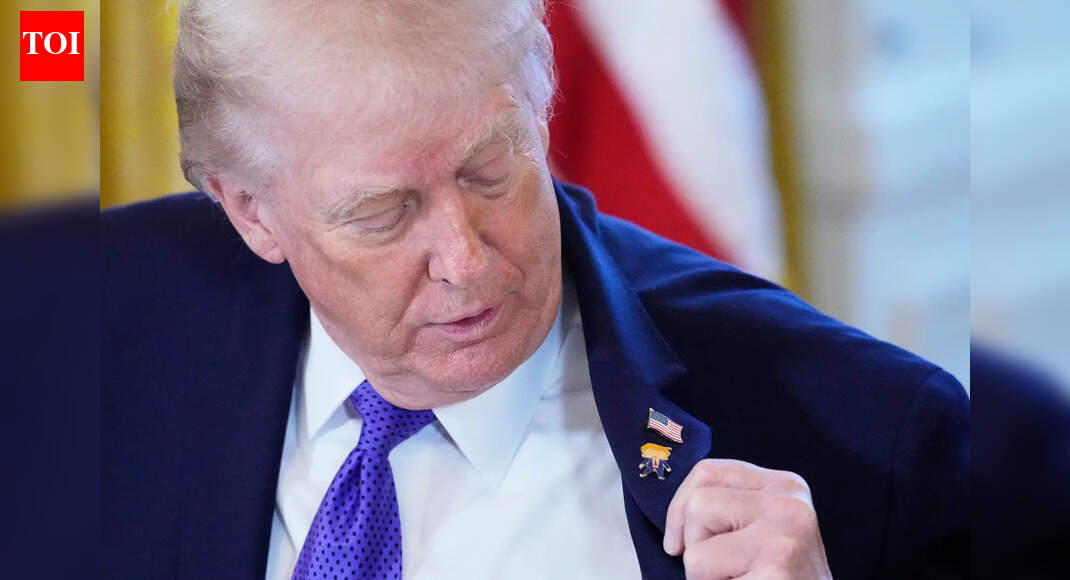 ‘Happy Trump’: Trump wears own lapel pin for meeting on Venezuelan oil