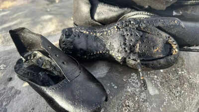Hundreds of starnge 19th-century boots are washing up on a beach in Wales — and no one knows why
