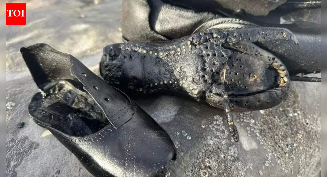 Hundreds of starnge 19th-century boots are washing up on a beach in Wales — and no one knows why