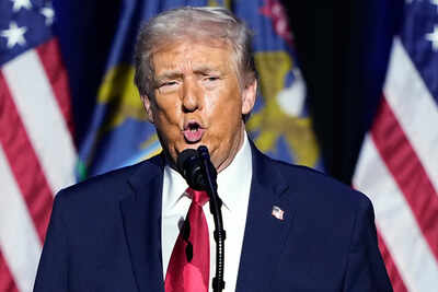 Trump hurls abuse and shows middle finger to Ford worker who shouted ‘pedophile protector’