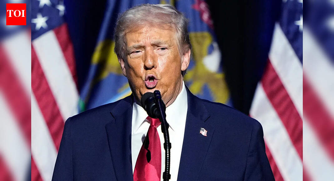 Trump hurls abuse and shows middle finger to Ford worker who shouted ‘pedophile protector’