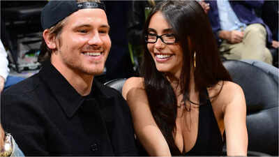 Justin Herbert’s girlfriend Madison Beer celebrates new album release in Times Square as Chargers QB faces early playoff heartbreak