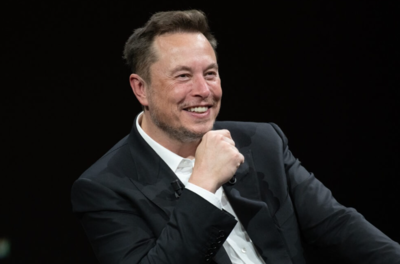 Elon Musk appears on Davos stage for the first time ever with the man who calls him a 'great friend' and says: I don't think it's such a bad ...