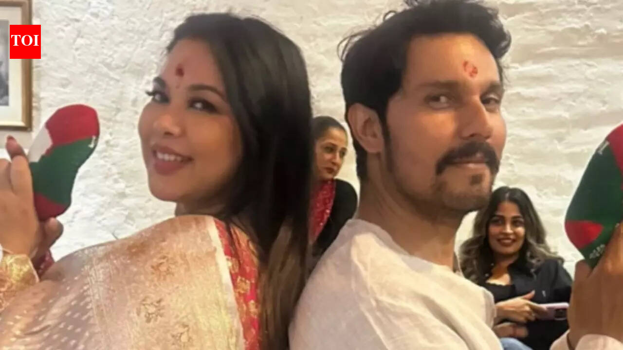 Mom-to-be Lin Laishram has traditional baby shower, glows in golden saree with Randeep Hooda - See PICS