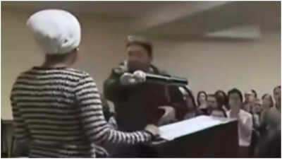 What was sprayed on Ilhan Omar during her chaotic town hall meeting?