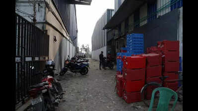 Business continues as usual at warehouse zone but fire safety lapses haunt locals