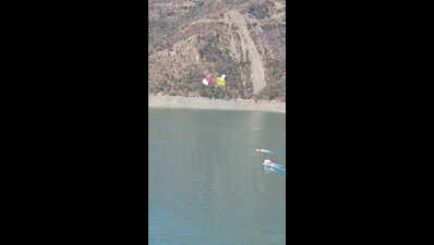 Mid-air stunt goes wrong as 2 paragliderscrash into Tehri Lake; SDRF rescues pilots