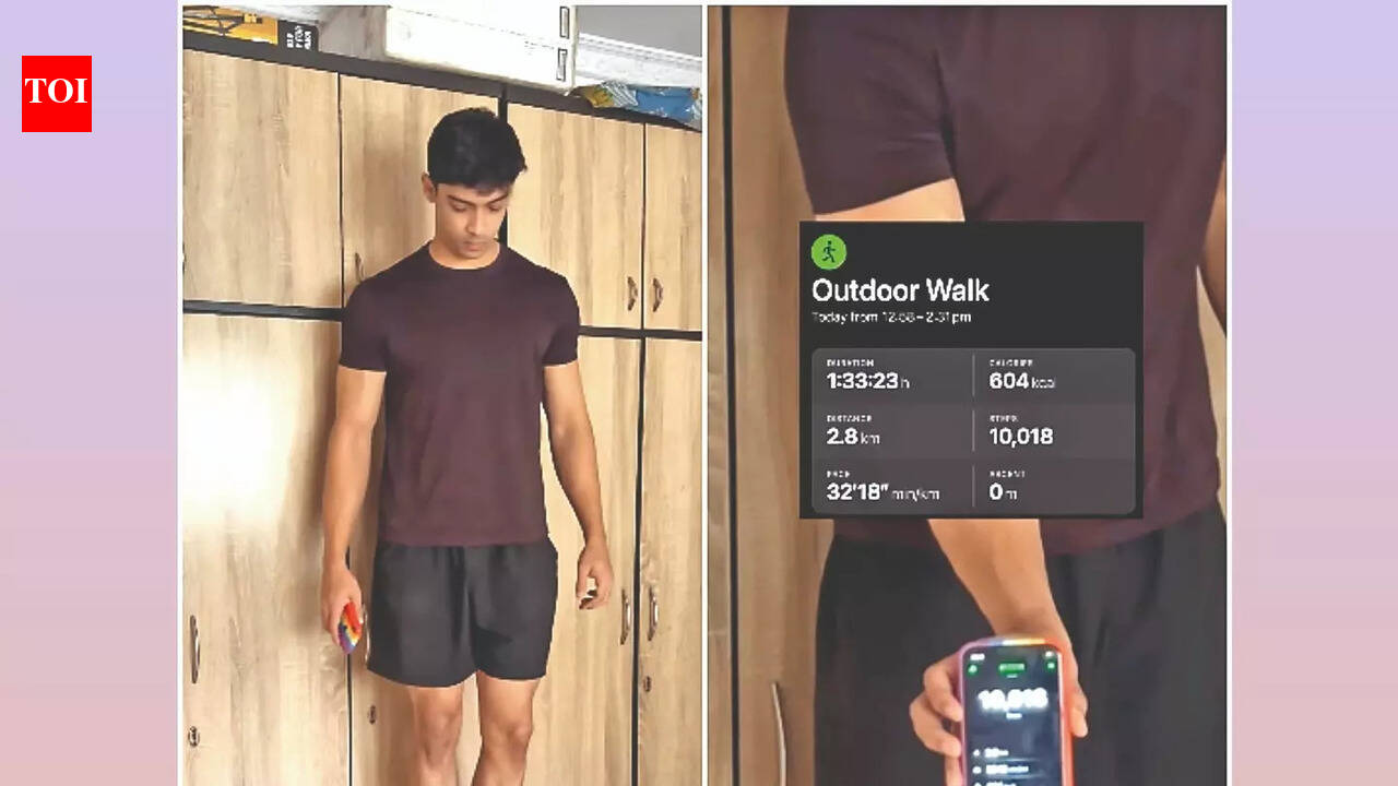 A man walking in place on a small wooden stool, completing 10,000 steps daily as captured in a viral video.