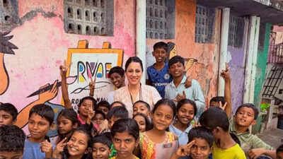 Indian teacher Rouble Nagi, who painted educational murals across slums, wins Global Teacher Prize