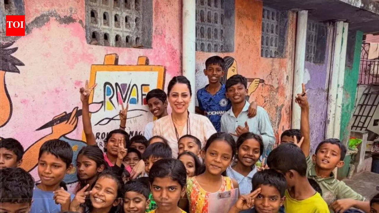 Indian teacher Rouble Nagi, who painted educational murals across slums, wins Global Teacher Prize