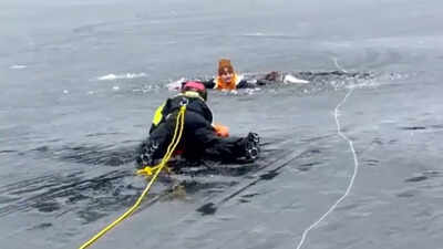  Ice training turns real in Washington as dive team rescues man who falls through frozen lake in front of them