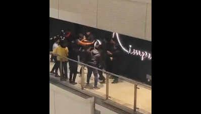 12 held after drunken brawl outside Gardens Galleria bar