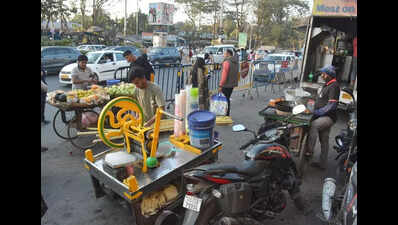 Hawkers gobble up even Grand pedestrian channel