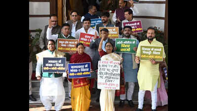 Opposition MLCs marshalled out of council, suspended for one day