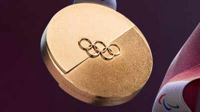  How much real gold is in a gold medal?