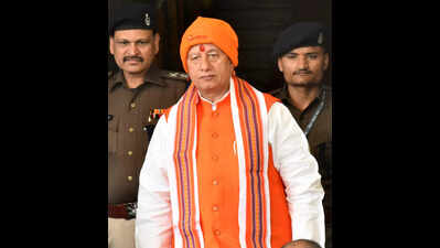 Strict action against illegal hoardings, parking: Dy CM