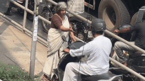 Watch: Elderly Kerala woman takes on scooter rider using footpath, wins internet’s praise