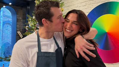 Dua Lipa and Callum Turner share a romantic red carpet moment at the Berlin Film Festival
