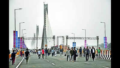 Day after inauguration, residents turn new bridge into social hub