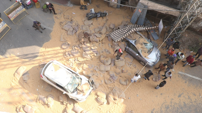 Ludhiana chaos: Overloaded truck topples, wheat sacks fall from flyover; vehicles damaged, 2 injured