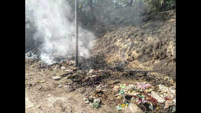 Residents choke as trash goes up in smoke