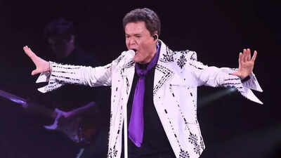 Concertgoer sues Donny Osmond and Harrah’s casino after allegedly being struck by an oversized ball at Las Vegas show