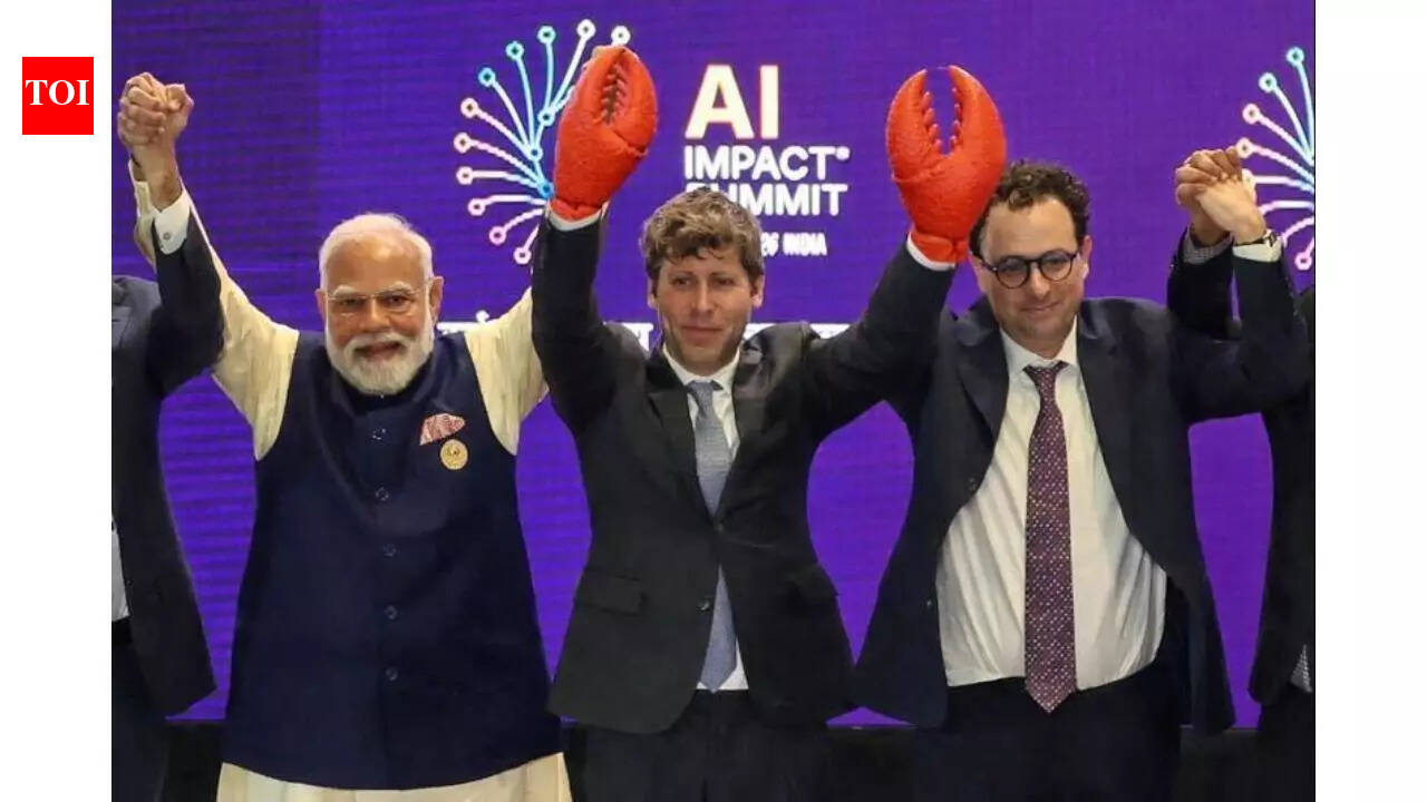 OpenAI shows its latest OpenClaw hire to 'tease' Anthropic in viral picture of Sam Altman and Dario Amodei from India AI Summit