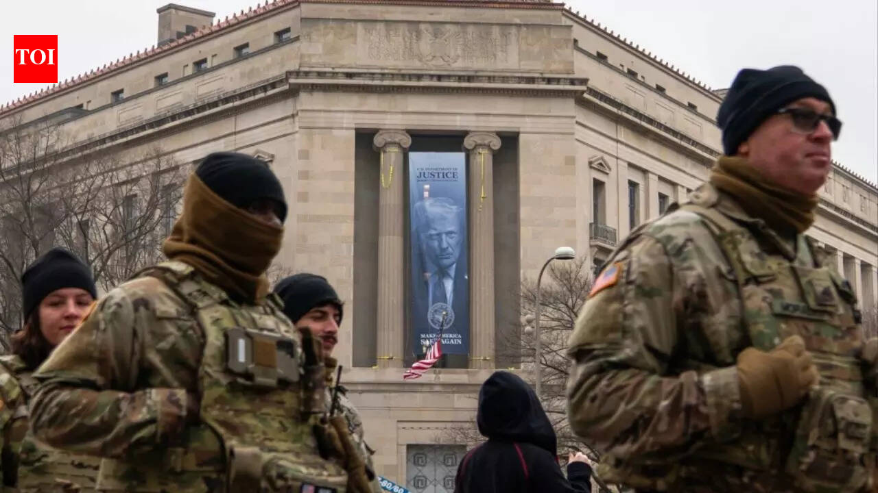 ‘Full blown North Korea vibes’: Huge banner with Trump’s face displayed at Justice Department HQ sparks backlash