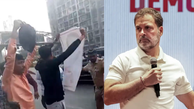 BJP shows black flag to Rahul Gandhi after Congress' shirtless protests at AI Summit