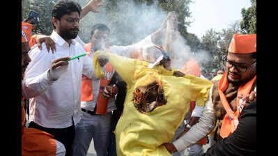 BJP Yuva Morcha stages protest against Cong stir at AI Summit
