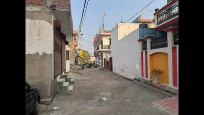 No aid, residents pool in money, repair road