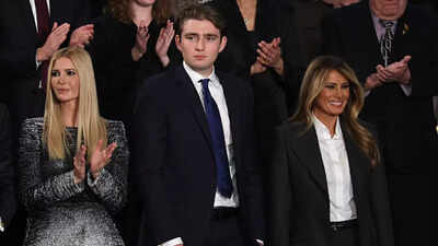  Barron Trump greets mother, the internet says he looks like his father